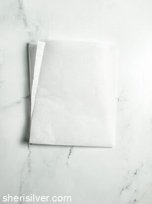 second step of how to make a parchment paper round