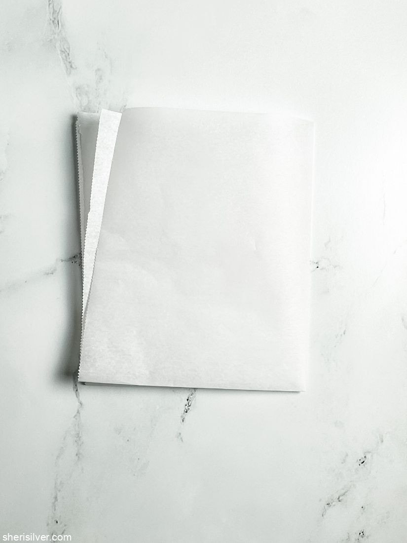 second step of how to make a parchment paper round