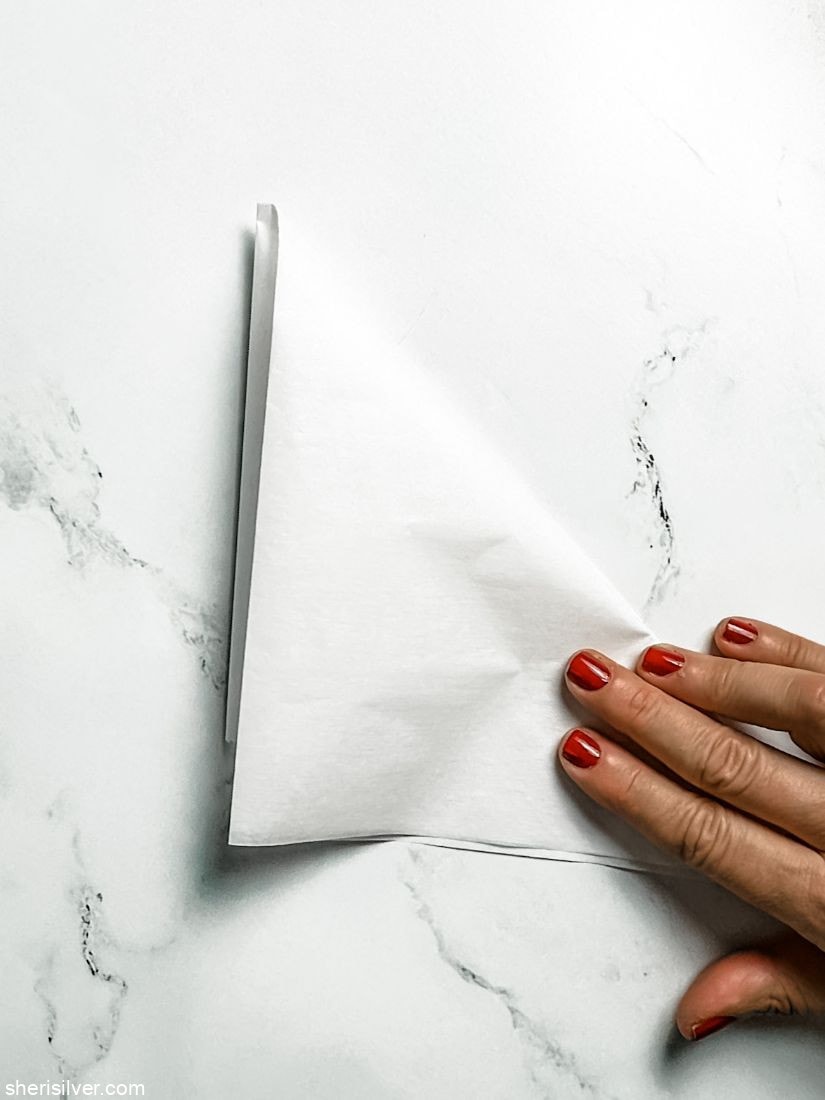 third step of how to make a parchment paper round