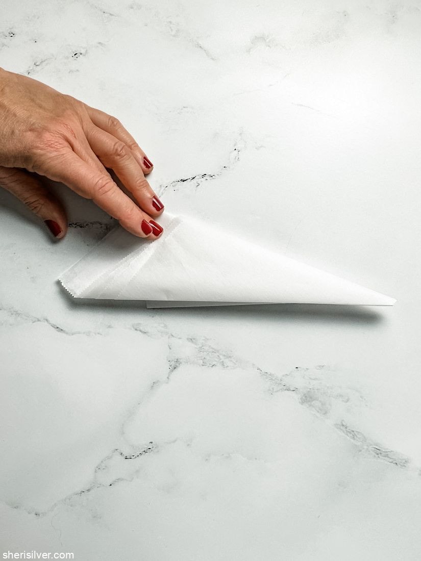 fourth step of how to make a parchment paper round