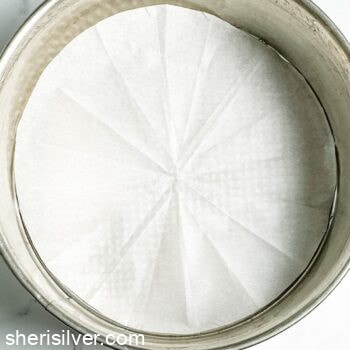 parchment paper circle in a round pan