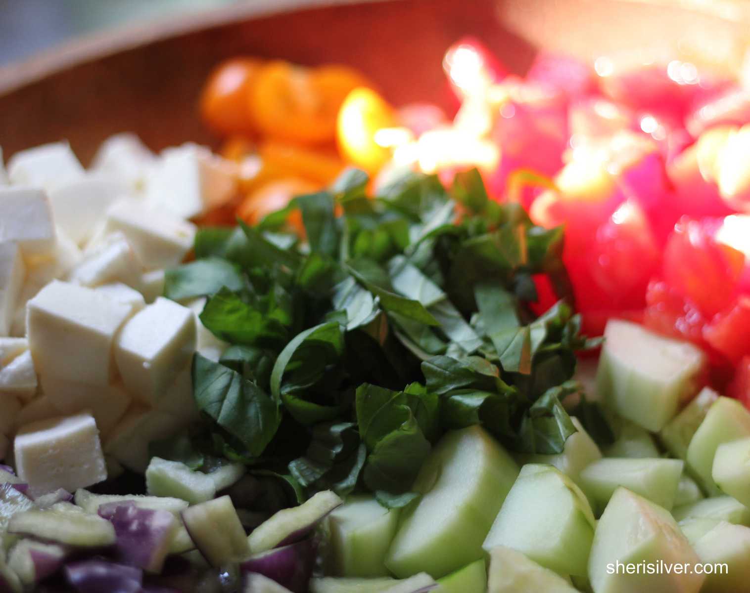 chopped tomatoes with basil and mozarella