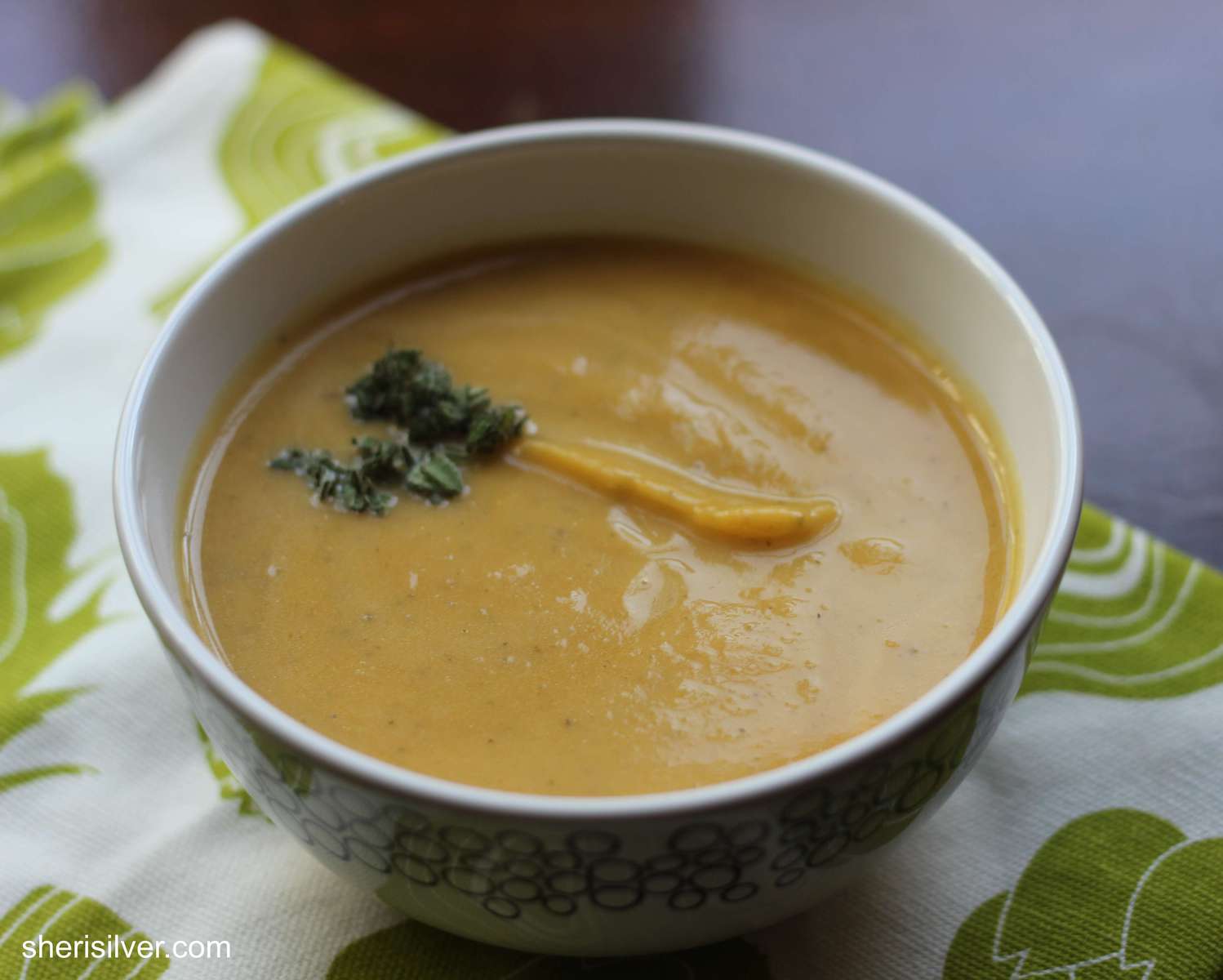 winter squash soup in white bowl