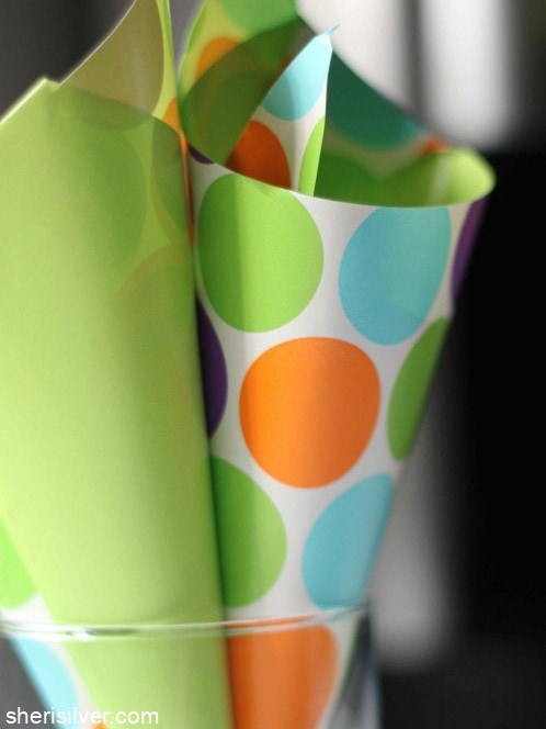 wrapping paper cones in a glass