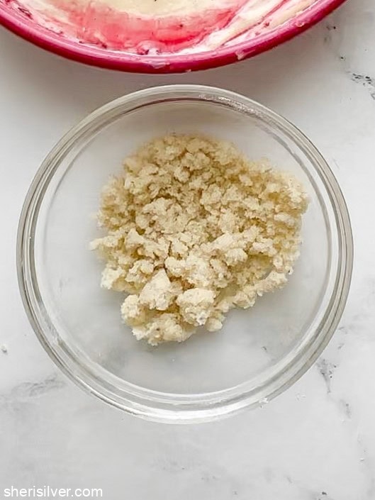 Vanilla sugar, flour, and butter mixed into small crumbs for coffee cake topping.