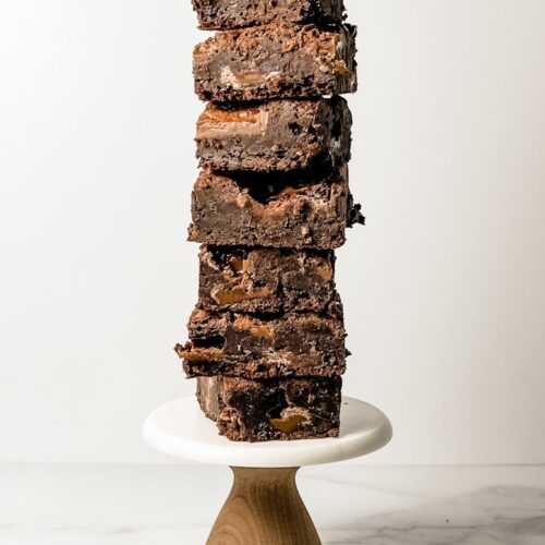 milky way brownies stacked on a mini cake stand
