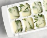 herbs in oil in an ice cube tray