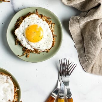 waffled hash browns topped with fried egg