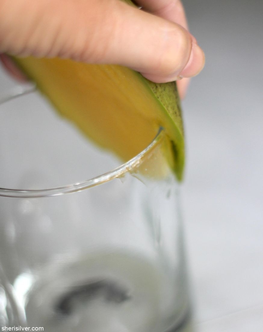 mango slice on a drinking glass