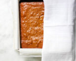 tea towel over warm cake