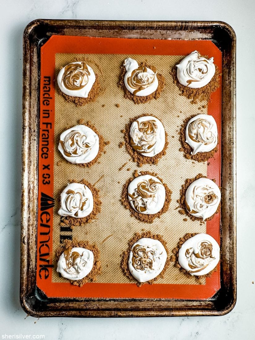 biscoff meringues on a silpat lined sheet pan