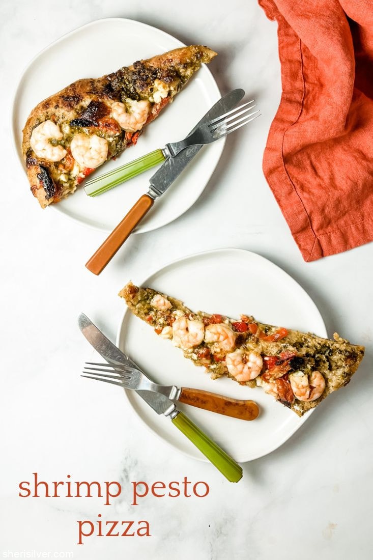 shrimp pesto pizza on white plates