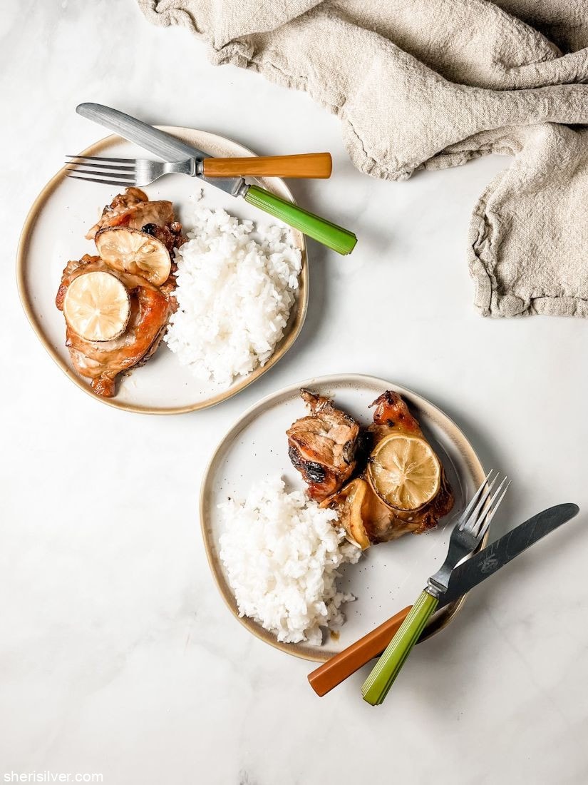 arnold palmer chicken on white plates with linen napkin and vintage cutlery