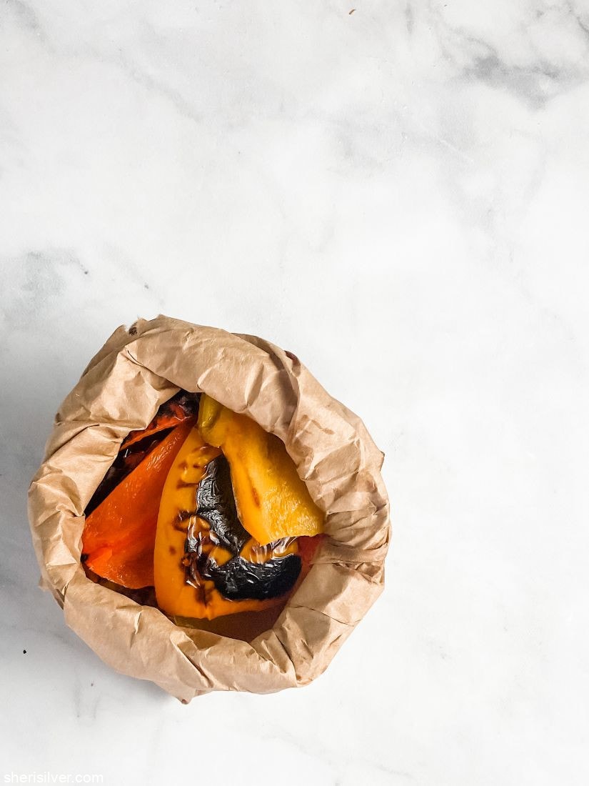 roasted peppers in a paper bag
