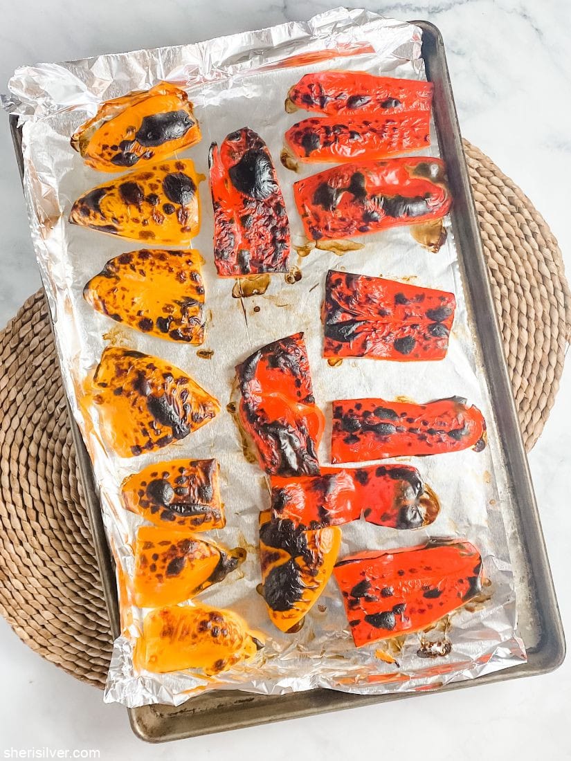 roasted peppers on a foil lined baking sheet