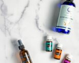 essential oils with witch hazel and glass spray bottle