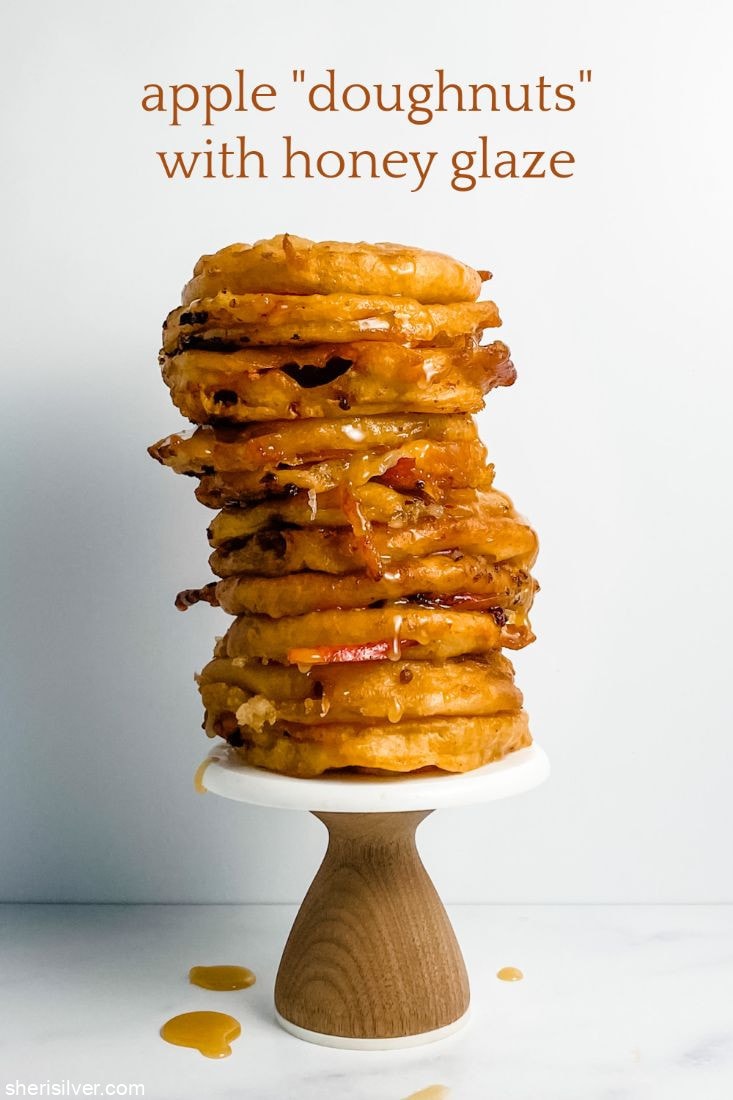 stack of fried apple slices with honey glaze on cake stand