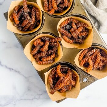 pumpkin spice pasta chips in muffin tin
