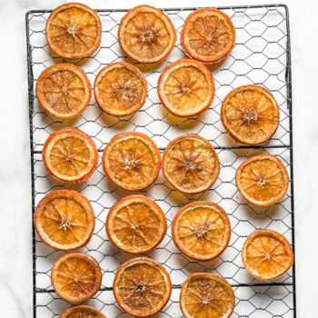candied orange slices on a wire rack