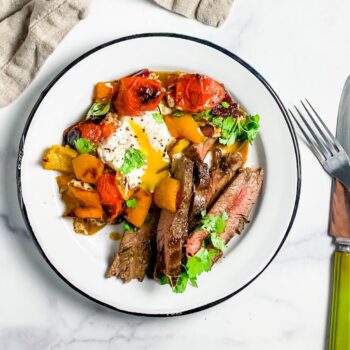 sheet pan steak and eggs on a plate