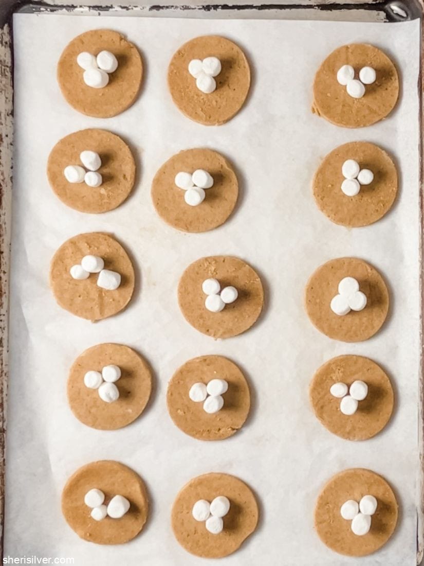 s'mores hamantaschen on a baking sheet