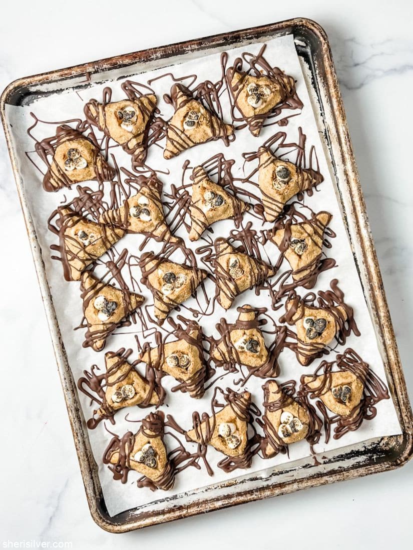 s'mores hamantaschen on a baking sheet