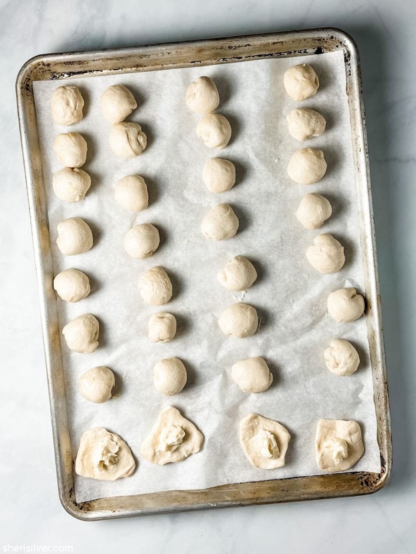 biscuit dough balls filled with sweetened cream cheese