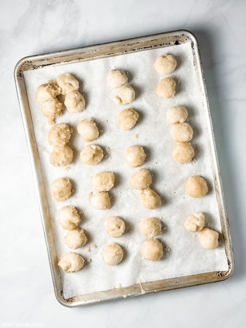 biscuit dough balls rolled in cardamom sugar