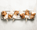 eton mess popsicles on a white ceramic tray