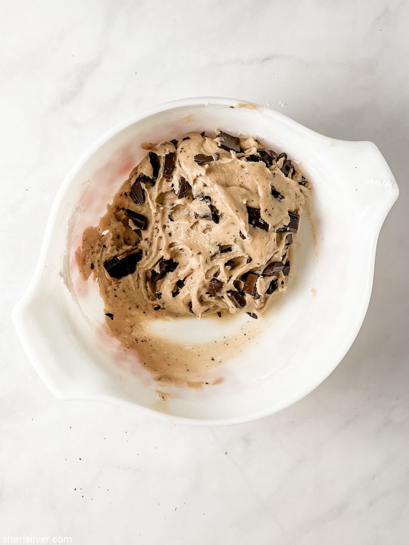 chocolate chunk cookie dough in a pyrex bowl