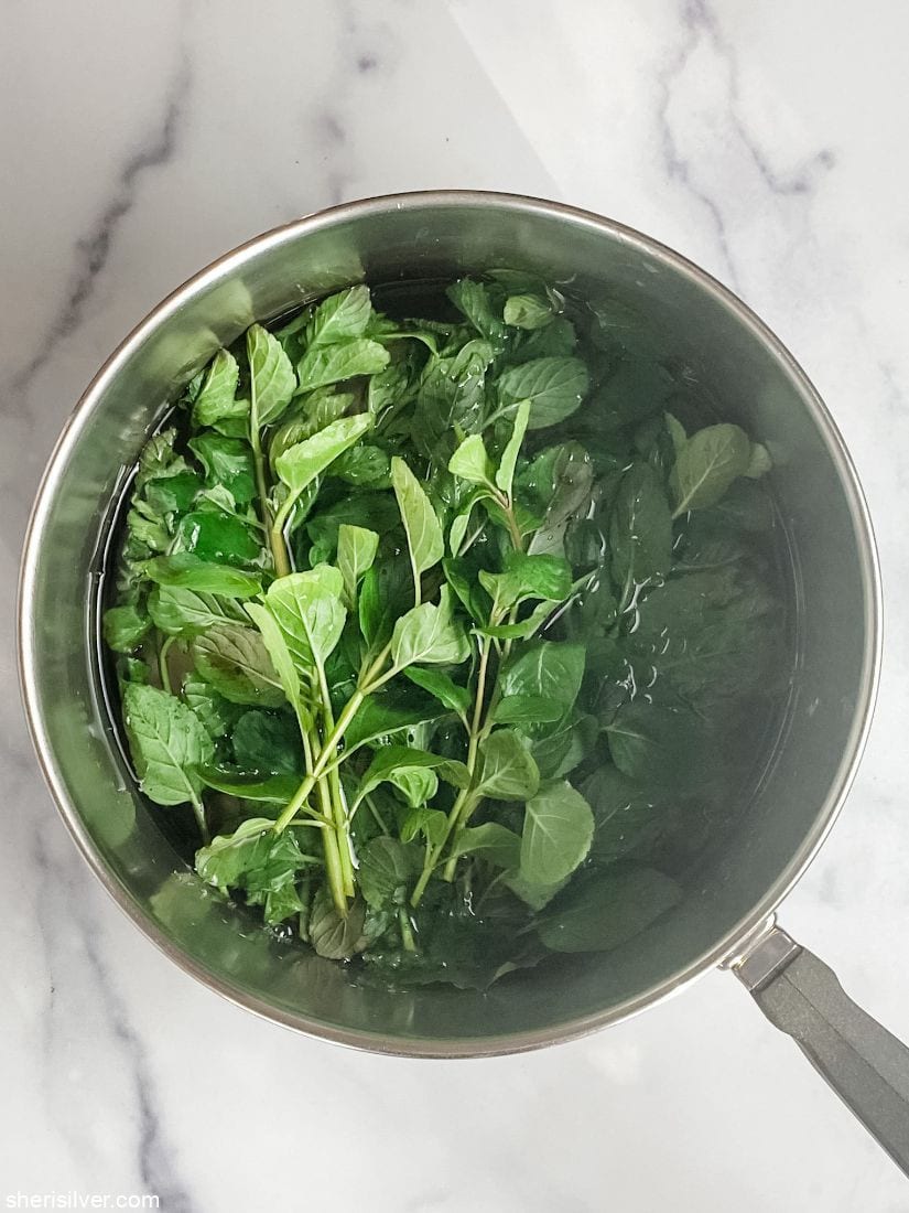 mint simple syrup in a saucepan