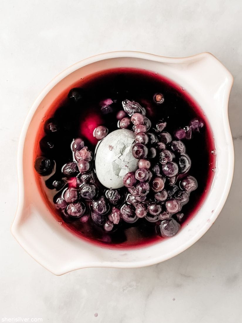 eggs and blueberries in a pyrex bowl