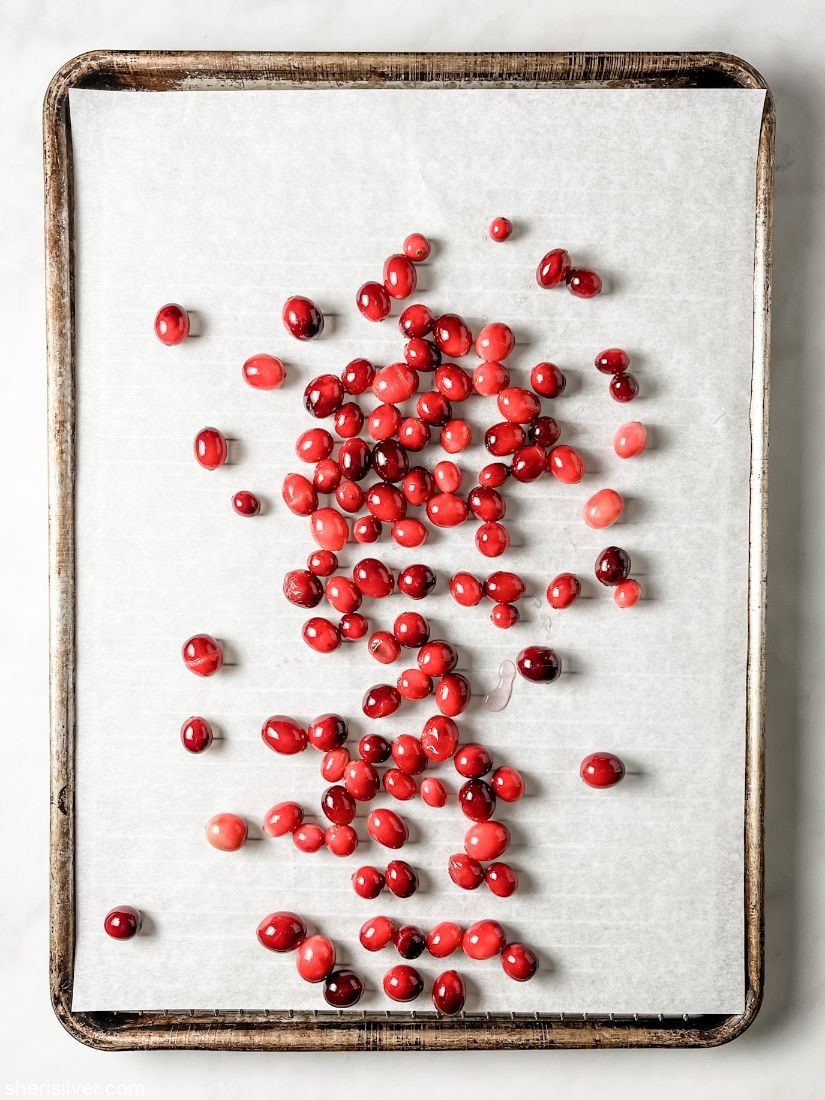 cranberries on a parchment lined wire rack