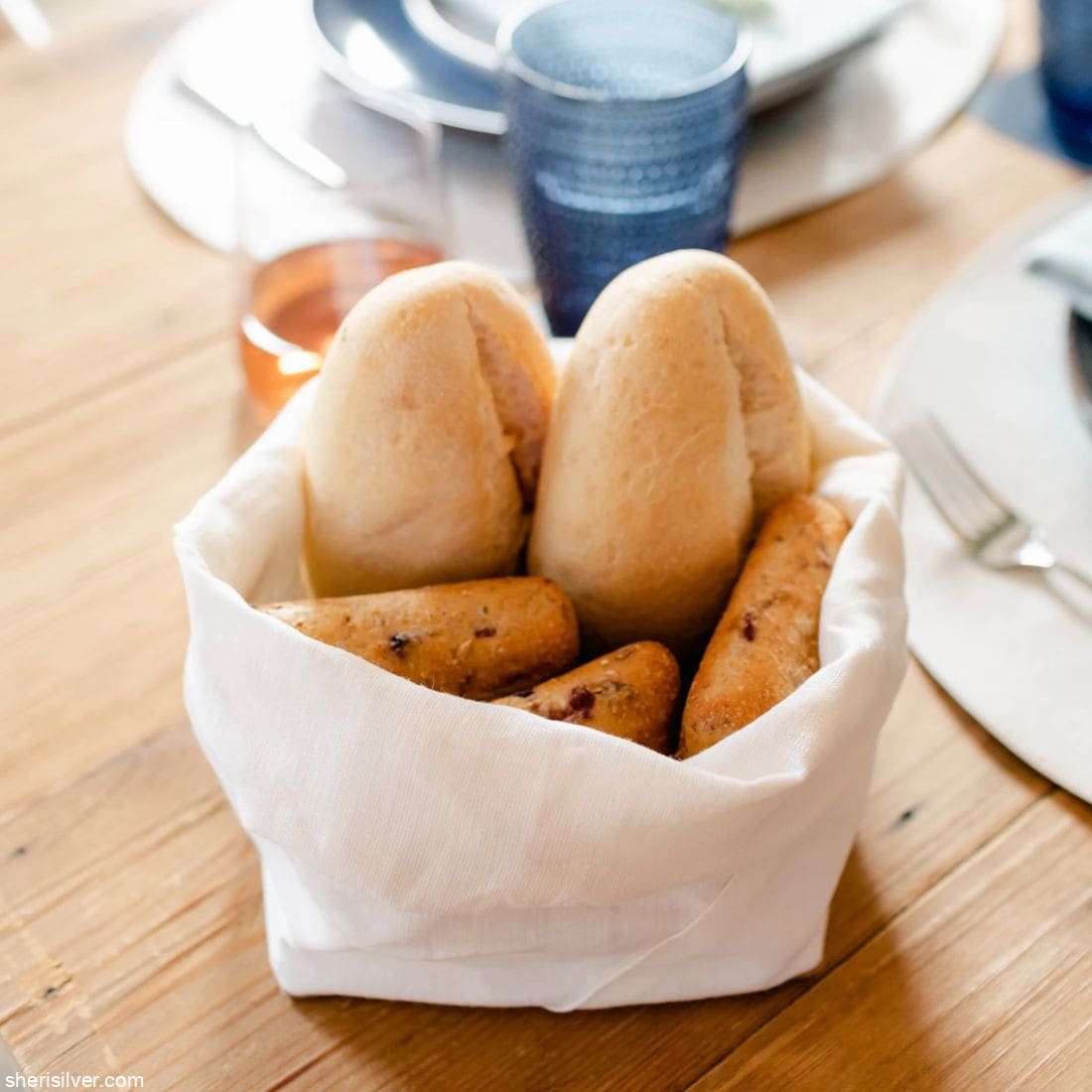 uashmama bread basket on a wood table