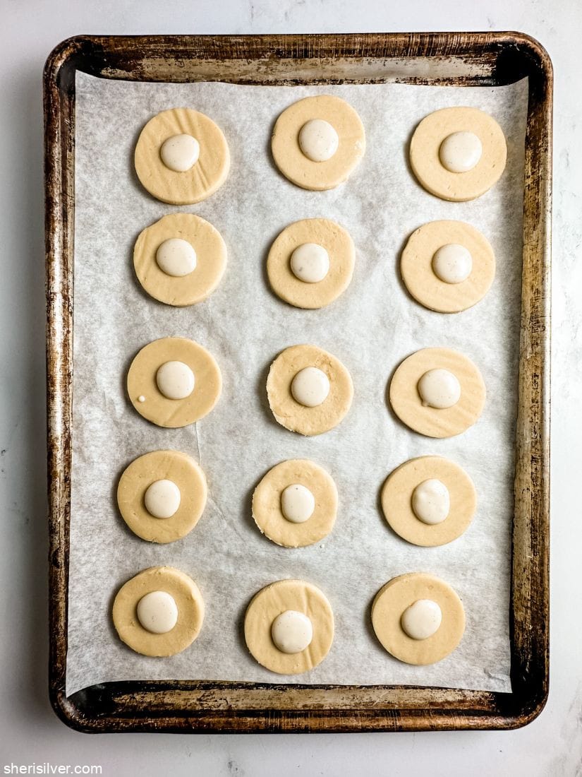creme brulee hamantaschen on a baking sheet