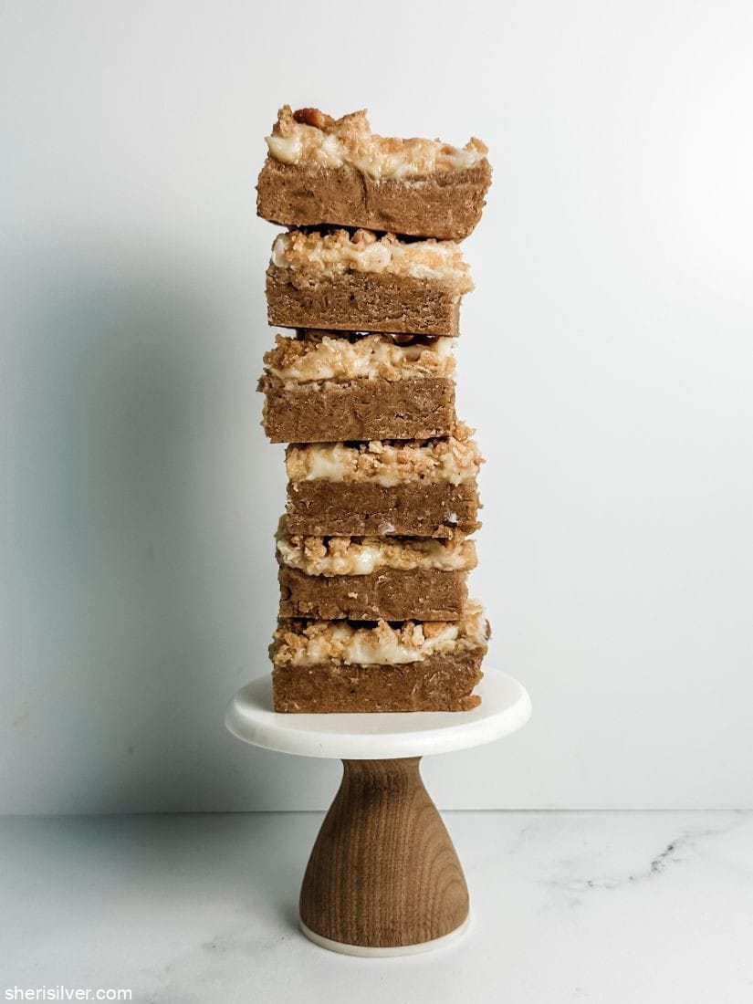 almond butter ritz crunch bars on a mini cake stand