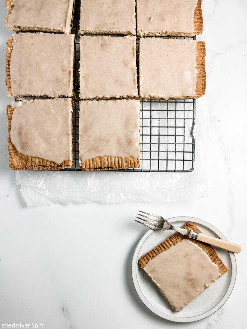 brown sugar slab pie on a white ceramic plate with vintage fork