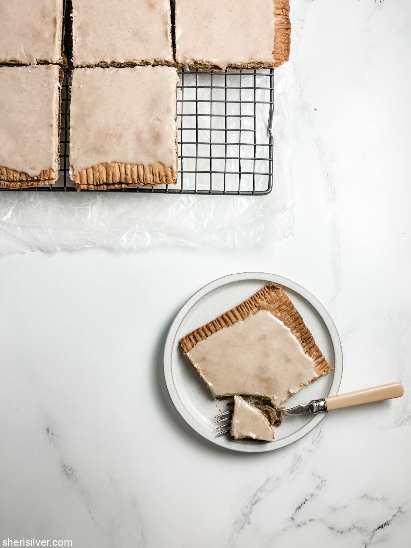 brown sugar slab pie on a white ceramic plate with vintage fork