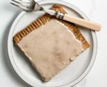brown sugar slab pie on a white ceramic plate with vintage fork