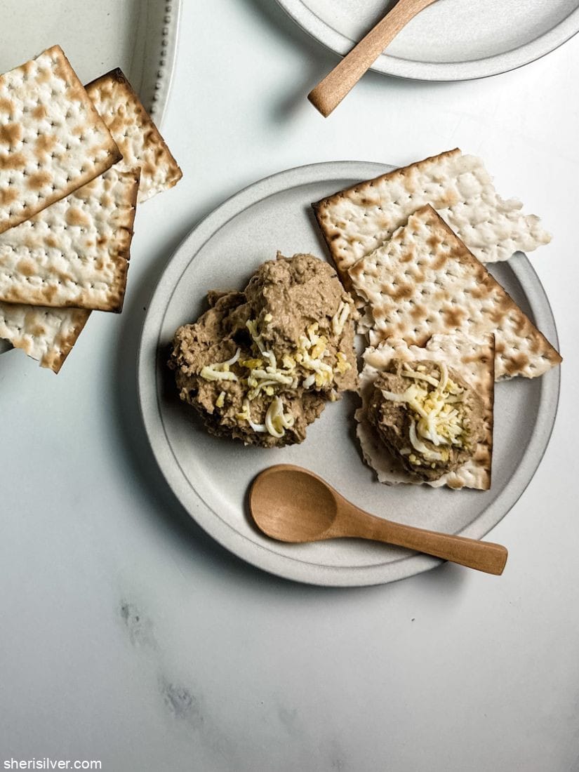 mock chopped liver on ceramic plates with matzoh