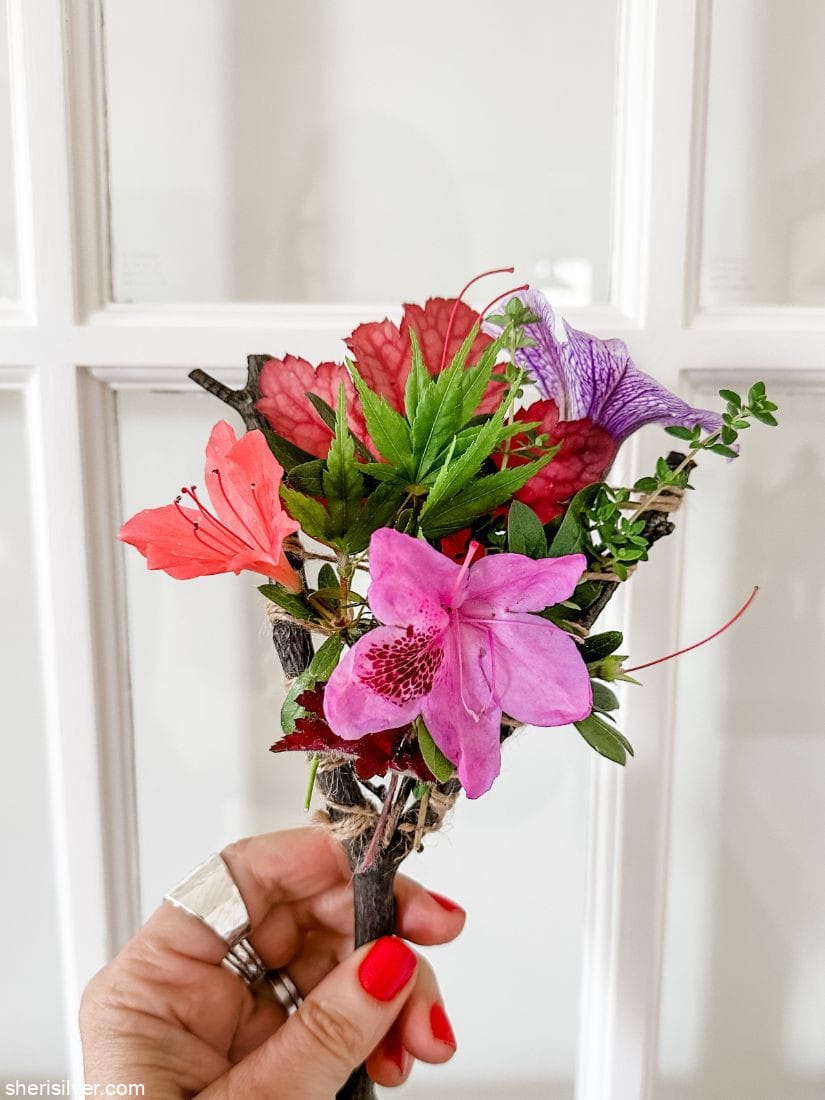 nature weaving in front of a french door