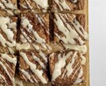 apple butter bars on a parchment lined wooden board
