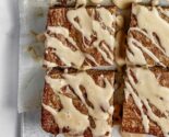 mocha chip blondies with coffee glaze on parchment paper