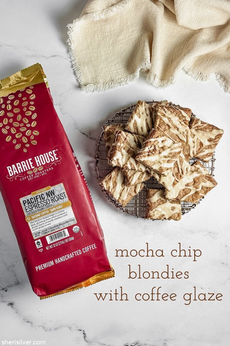 mocha chip blondies with coffee glaze next to a bag of coffee