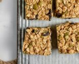 pumpkin spice granola bars on a parchment lined ribbed metal tray