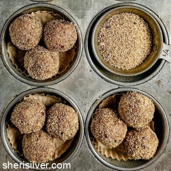 tahini date truffles in a vintage muffin tin with a dish of coffee cake sugar