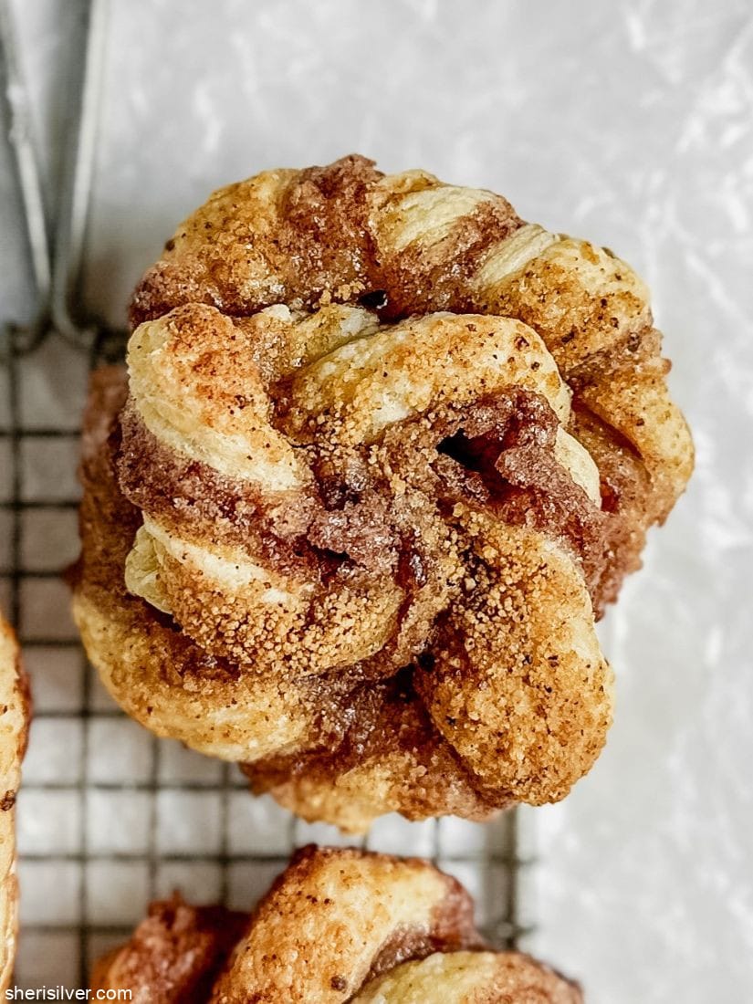 puff pastry spirals on a safety grater