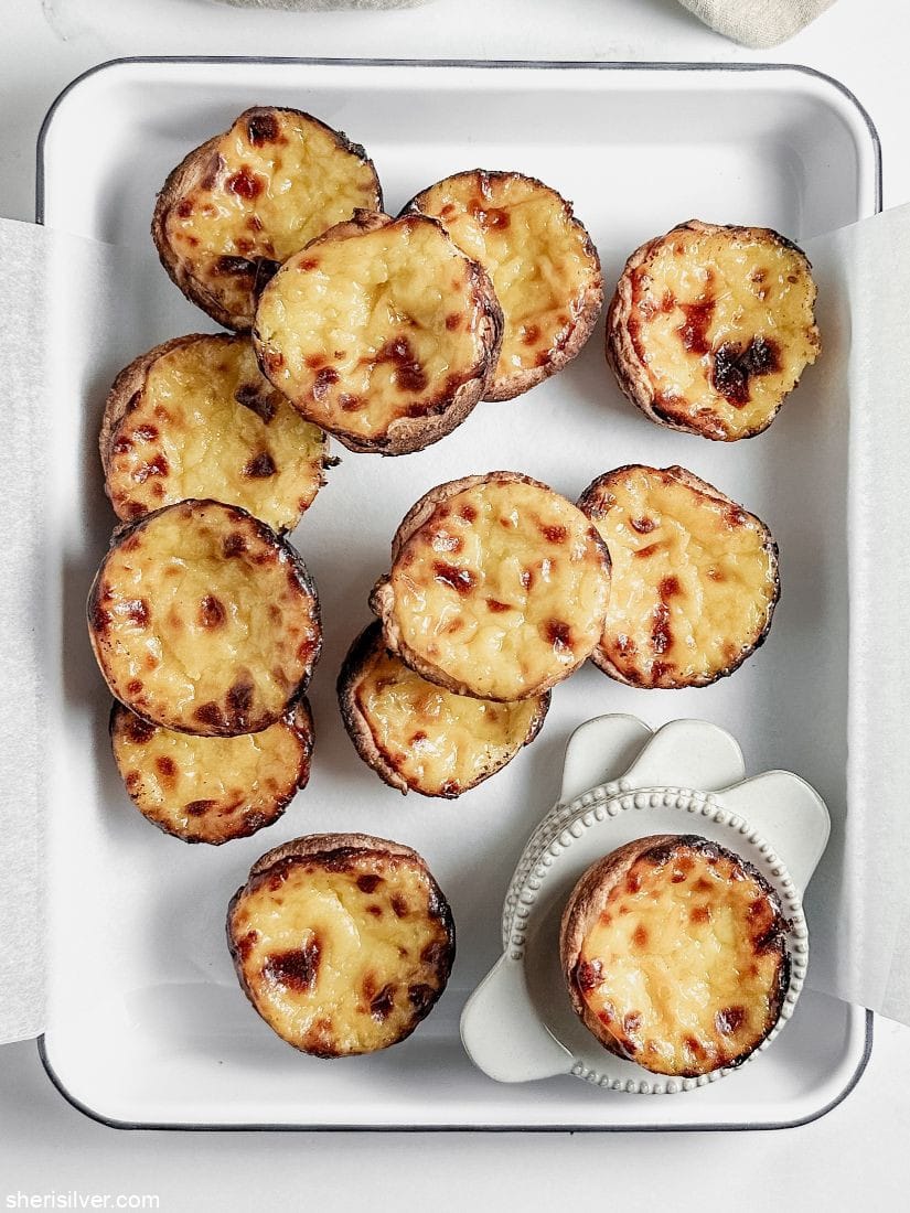 pasteis de nata in a white tray