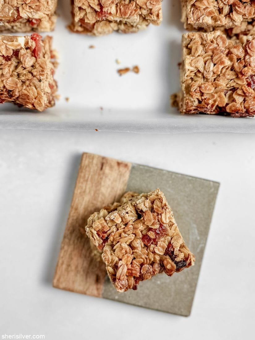 anything goes granola bar on a wood and stone coaster