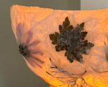 homemade nature lantern on a newel post